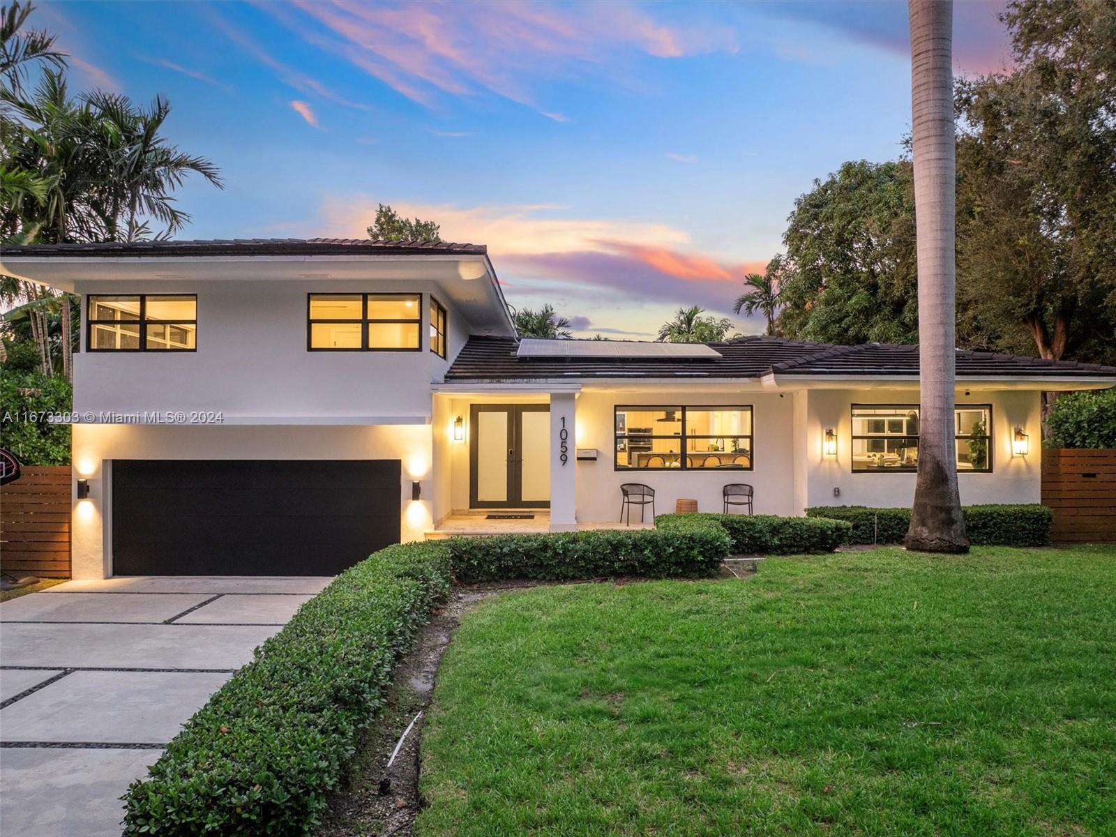 Check out this stunning, fully renovated home in the desirable East Miami Shores neighborhood. It is tucked away on a peaceful dead-end street, just moments from the water and features top of the line finishes throughout the home. With 3 bedrooms and 3 full bathrooms, this property sits on an expansive nearly 10,000 SF lot. The home is bathed in natural light, featuring an open kitchen floor plan that creates bright, airy living spaces. The primary suite is impressively spacious, offering a generous walk-in closet and an ensuite bath that’s equally as inviting. The backyard is a true entertainers paradise, with an oversized pool, fully turfed outdoor space with outdoor shower and a 16x16’ outdoor kitchen cabana with top of the line Bull appliances.