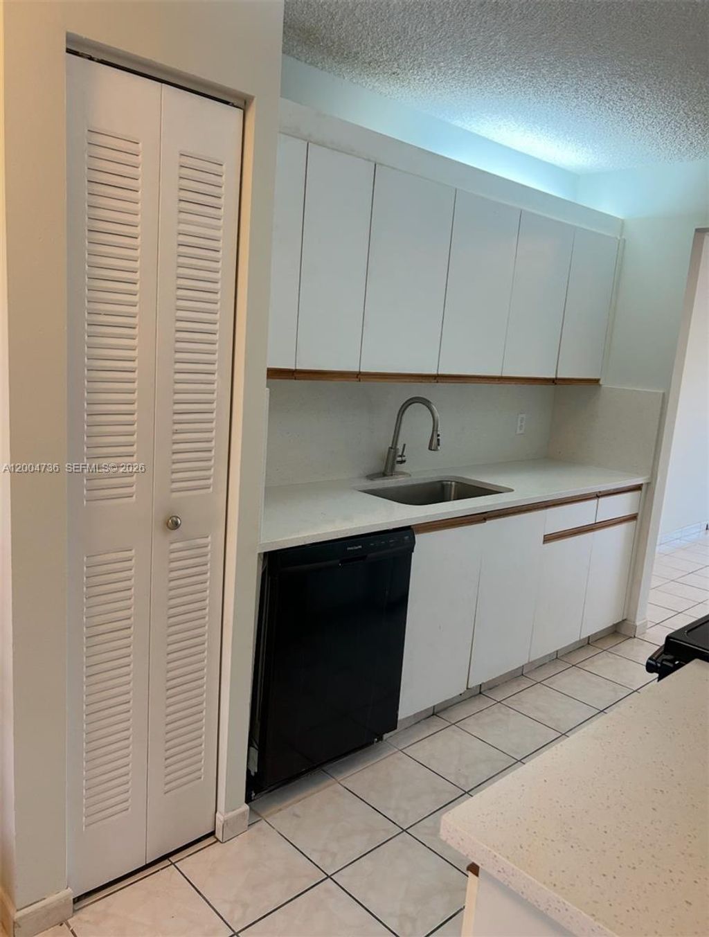 Photo of 12501 SW 14th St #315R, Pembroke Pines, FL 33027 (MLS # A12004736)