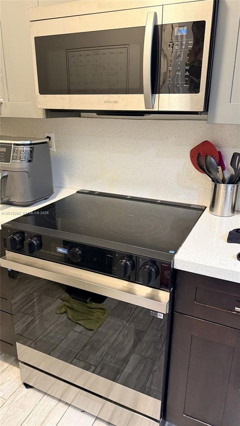 Tiny photo for 8590 SW 212th St #303, Cutler Bay, FL 33189 (MLS # A12010262)