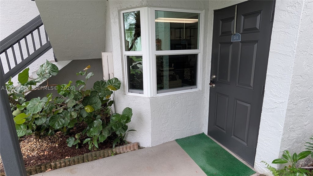 Photo of 211 SW 113th Way #211, Pembroke Pines, FL 33025 (MLS # A12090083)