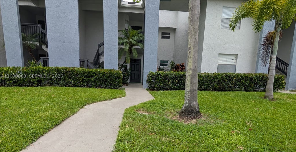 Photo of 211 SW 113th Way #211, Pembroke Pines, FL 33025 (MLS # A12090083)