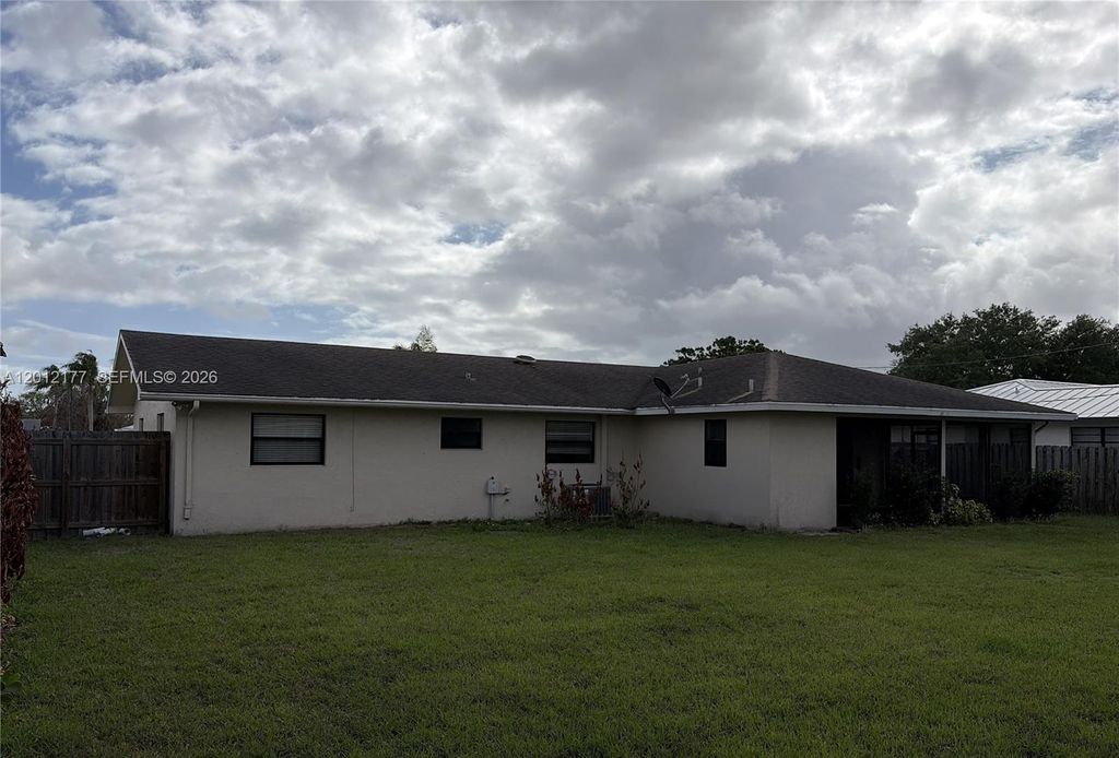 Photo of 440 SE Skipper Ln, Port St Lucie, FL 34983 (MLS # A12012177)