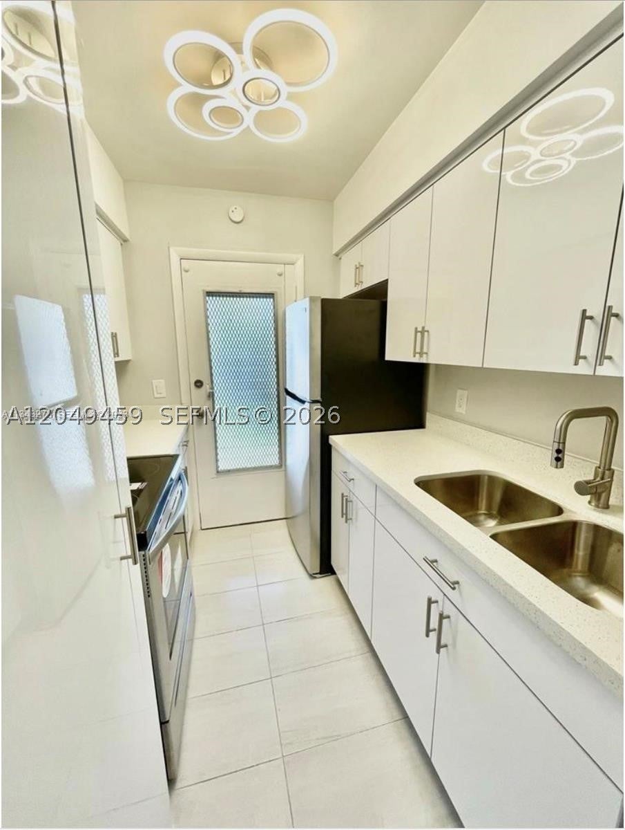 Photo of 1431 S 14th Ave #208, Hollywood, FL 33020 (MLS # A12049459)