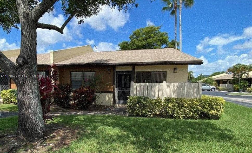Don't miss this opportunity to own this move in ready villa at the desirable all ages Woodlake Isles community. This 2/2 villa offers an open floorplan, laminate flooring throughout, inside laundry, 2 patios and a spacious kitchen. Community offers 2 swimming pools, clubhouse, sauna, tennis court, gazebo with dock, non-motorized boats accepted. The HOA covers insurance, roof maintenance, exterior paint, and grounds maintenance. Close to schools, shopping, beaches and major highways. This property qualifies Conventional/FHA financing.