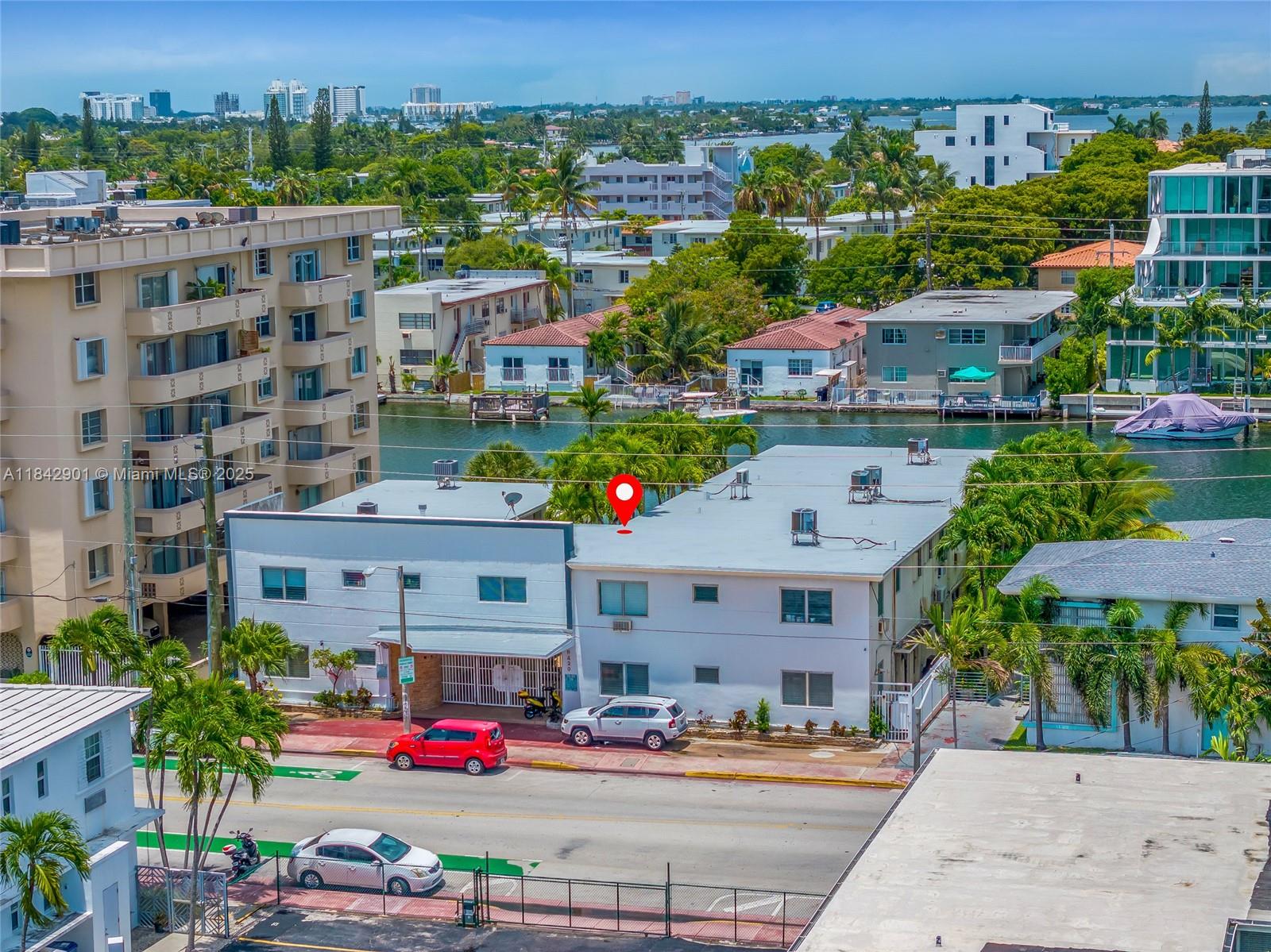 Charming and spacious studio thoughtfully converted into a 1-bedroom in the heart of North Beach, just three blocks from the ocean. Located in a boutique waterfront building, this unique residence features laminate flooring throughout, in-unit washer and dryer, and plenty of character. Enjoy soaking up the sun and getting your vitamin D while lounging by the water. Offered furnished for added convenience—perfect as a primary residence, beach getaway, or investment. Walk to shops, dining, and the sand. Easy to show and ready to impress! Very easy to show.