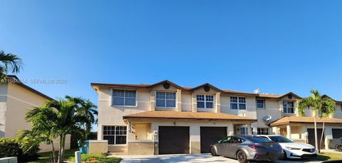 Photo of 3379 NW 198th Terrace, Miami Gardens, FL 33056 (MLS # A11984854)