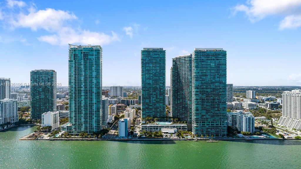 Live in the center of Miami at Paraiso Bay in Edgewater. Enjoy bayfront views, a deep terrace, and private elevator foyers from this 2 bedroom 3 bath residence at Paraiso Bay. Amenities feature resort style beach entry pool overlooking Biscayne bay, tennis courts top of the line fitness center, spa, bowling alley, club rooms, and onsite café and so much more. The community features a baywalk, onsite restaurant Amara and shops, park with separate children and pet areas and is growing at a fast rate. Schedule your showing today. Centrally located to all the best neighborhoods in Miami. Will not last. Rented until Oct 2025