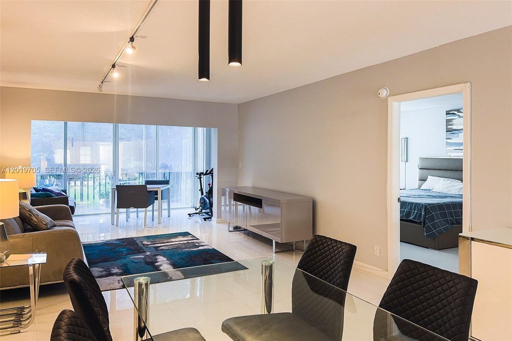 Photo of 3200 N Palm Aire Dr #207, Pompano Beach, FL 33069 (MLS # A12019705)