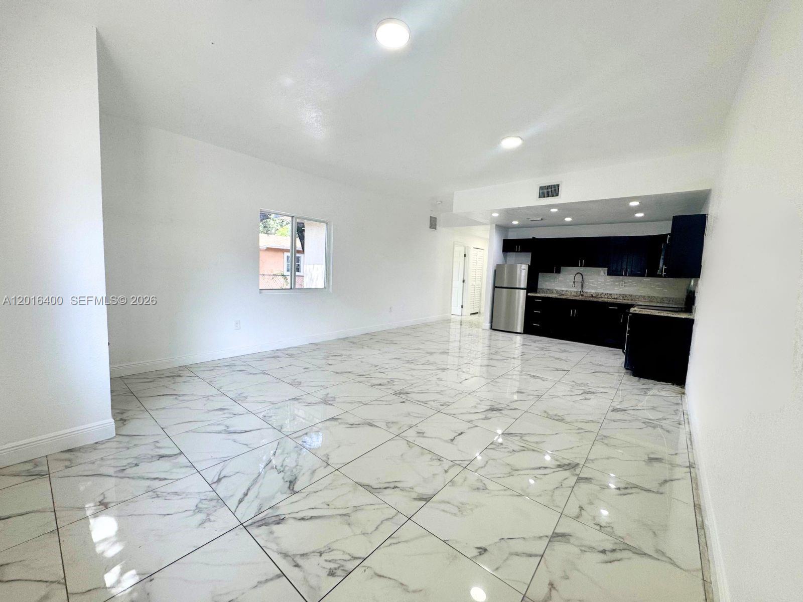 7703 NW 3rd Ave n/a