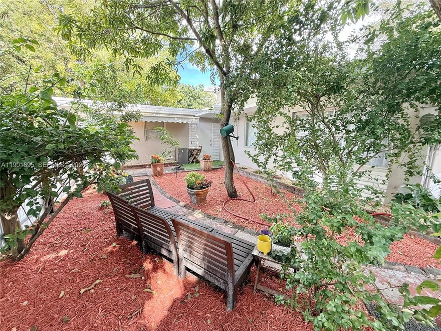 Residential Multi-Family zoning, PERFECT FOR A FAMILY LOOKING FOR INLAW HOME OR ROOM RENTALS. Great investment. Bright & spacious home with unique layout, This home is larger than the average home w/ 2300 sf. Featuring 5+ Bedrooms, 2+ bathrooms, plus additional room perfect for offices or gym or playroom, etc. with private entrances. Updated kitchen features Quartz stone Countertops. Private 7K sf lot and fully fenced in home. This spacious home includes est 1000 sf fully equipped 1BR / 1Bath separate KOSHER kitchen or inlaw suite or potential for room rentals w/private entrances. High volume ceilings. Large exterior 10 x 6 Laundry room located in rear of home has own private entrance. Home is larger than sf on BCPA. NO HOA fees. Dade County rated Hurricane coverings. Located just 10 minutes to the beach, close to shopping, downtown Hollywood, hospital, airport, major highways. Parking 4 cars + RV/Boat. Finished garage is used as 5th bedroom. NO HOA PARKING. AMPLE PARKING IN FRONT OF HOME TO PARK YOUR TRUCK OR CAR TO ADVERTISE YOUR BUSINESS. ADU= Additional Dwelling Units. RM-9 zoning designation. 5th bedroom is the garage w/ a full bath.