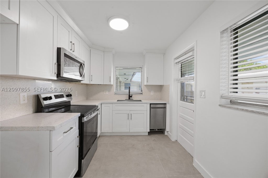 Photo of 5141 Hollywood Blvd #202, Hollywood, FL 33021 (MLS # A12097855)