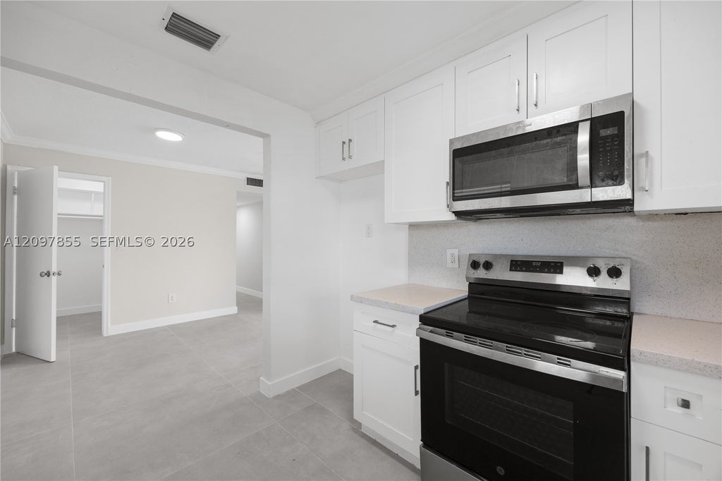 Photo of 5141 Hollywood Blvd #202, Hollywood, FL 33021 (MLS # A12097855)