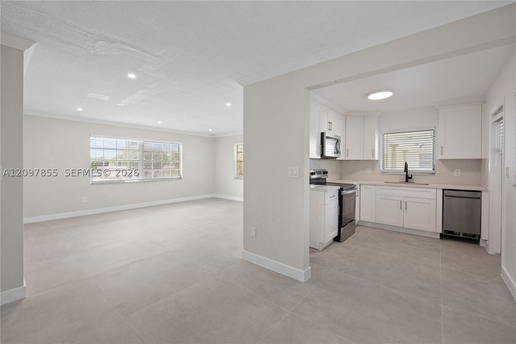 Photo of 5141 Hollywood Blvd #202, Hollywood, FL 33021 (MLS # A12097855)