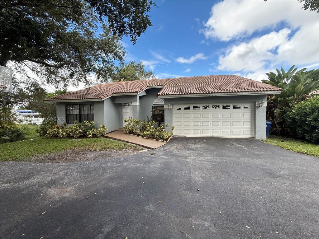 Photo of 2456 NW 97th Ln, Coral Springs, FL 33065 (MLS # A11893015)
