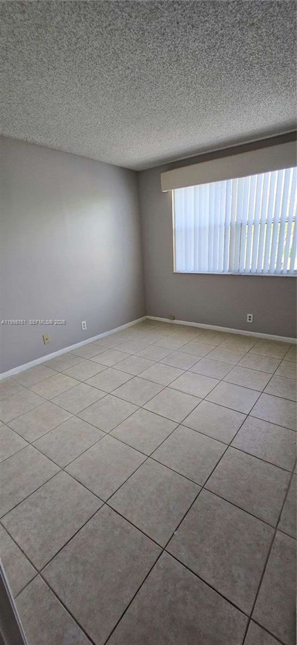 Photo of 8901 Wiles Rd #303, Coral Springs, FL 33067 (MLS # A11998761)
