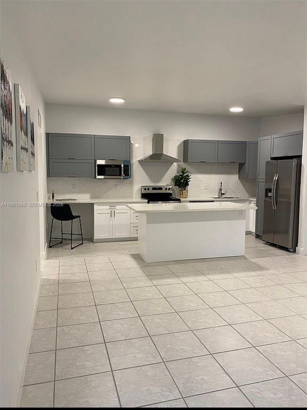 Photo of 9346 S Belfort Cir #215, Tamarac, FL 33321 (MLS # A11991269)