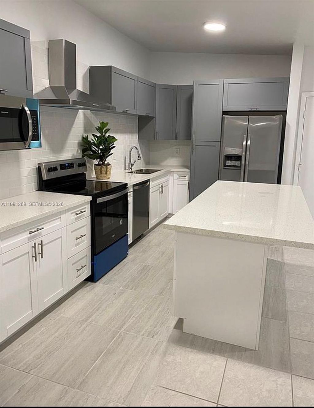 Photo of 9346 S Belfort Cir #215, Tamarac, FL 33321 (MLS # A11991269)