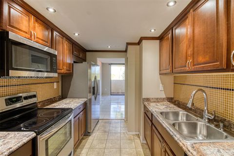 Photo of 7401 NW 16th St #408, Plantation, FL 33313 (MLS # A11971092)