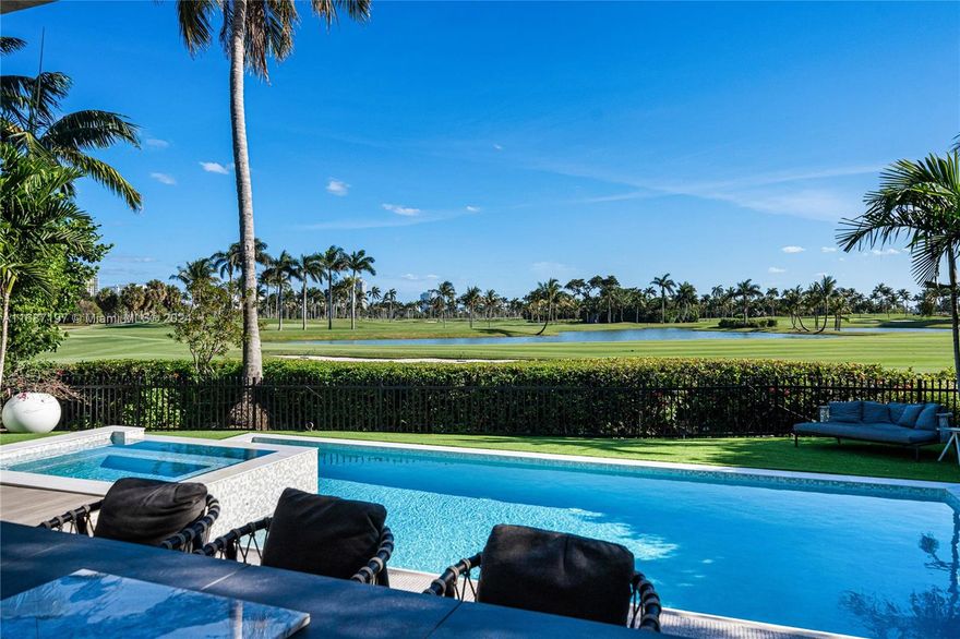Experience modern luxury on La Gorce Golf Course in Miami Beach. This custom Smart Home offers breathtaking views, featuring 5 bedrooms, 5.5 baths, and 4,542 sq ft of elegance under air. The chef’s kitchen boasts marble counters and a butler's pantry. Entertain with a custom BBQ and pizza oven in the private yard. The primary suite includes a custom closet and renovated bath. Relax in the infrared sauna, saltwater pool, or Jacuzzi with panoramic views. Advanced tech features include Lutron Shades and water filtration though out. Furnished with pieces from Miami's Design District, this home also offers a private roof deck, garage, and wine storage. Experience unparalleled elegance in this prime Miami Beach location.