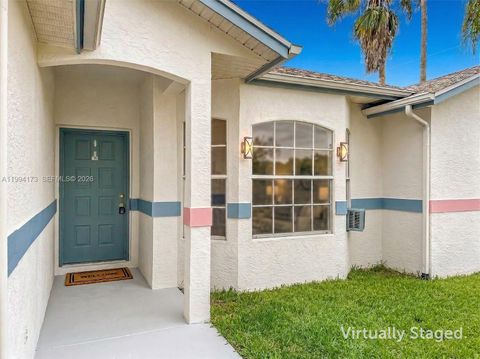 Photo of 701 SW Amber Ter, Port St Lucie, FL 34953 (MLS # A11994173)