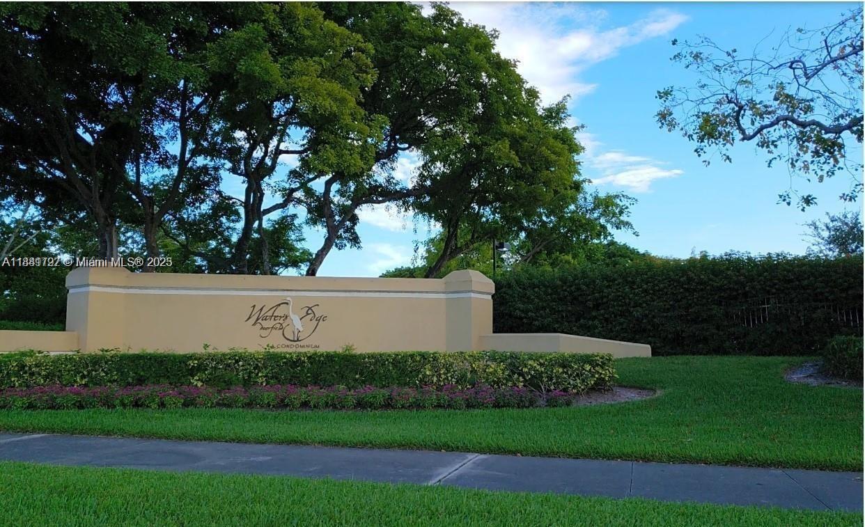This beautiful 3 bedroom, 2 bath unit offers peaceful water views and a modern, updated living space with a sleek remodeled kitchen, perfect for entertaining or enjoying quiet evenings in. With luxury vinyl plank floors, stainless steel appliances, and a washer/dryer, this unit is designed for both comfort and convenience. Enjoy resort-style living with access to a heated pool, spa, and fitness center. Located in the gated Waters Edge Deerfield Beach community, you're just minutes away from beaches, shops, and major highways.