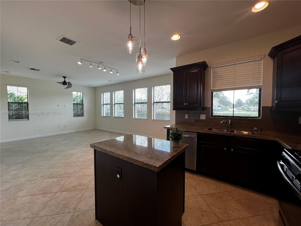 Photo of 12578 NW 32nd Mnr #4, Sunrise, FL 33323 (MLS # A11684512)