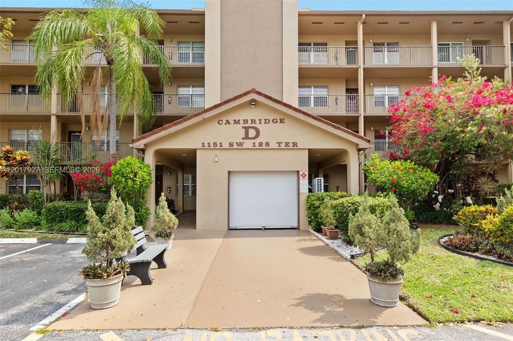 Photo of 1151 SW 128th Ter #204D, Pembroke Pines, FL 33027 (MLS # A12017927)