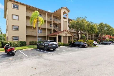 Photo of 1151 SW 128th Ter #204D, Pembroke Pines, FL 33027 (MLS # A12017927)