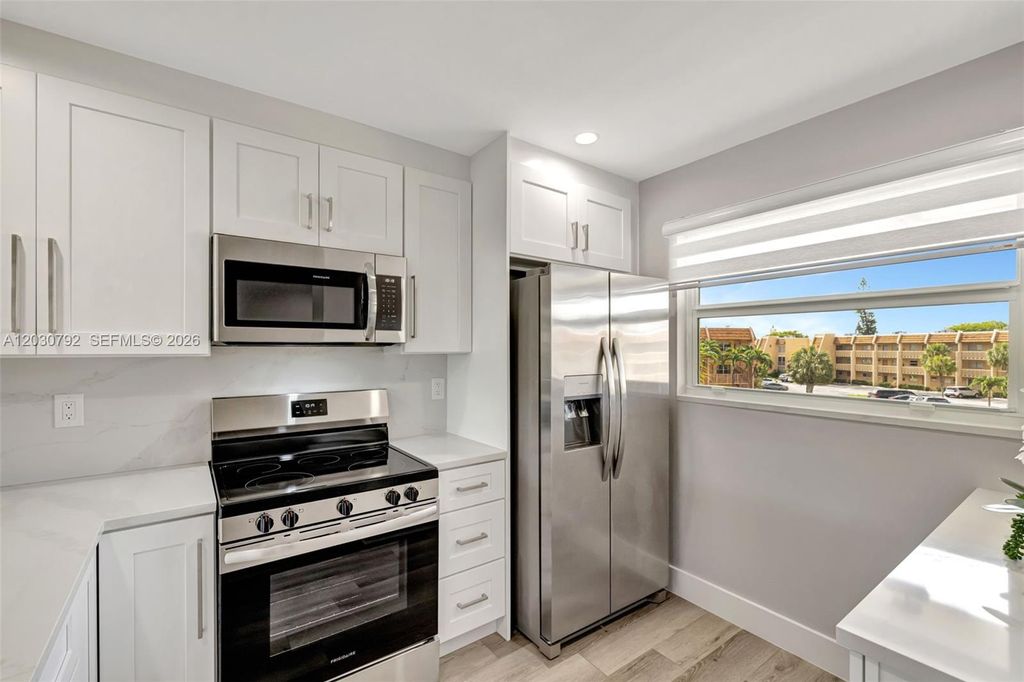 Photo of 6800 Royal Palm Blvd #302F, Margate, FL 33063 (MLS # A12030792)