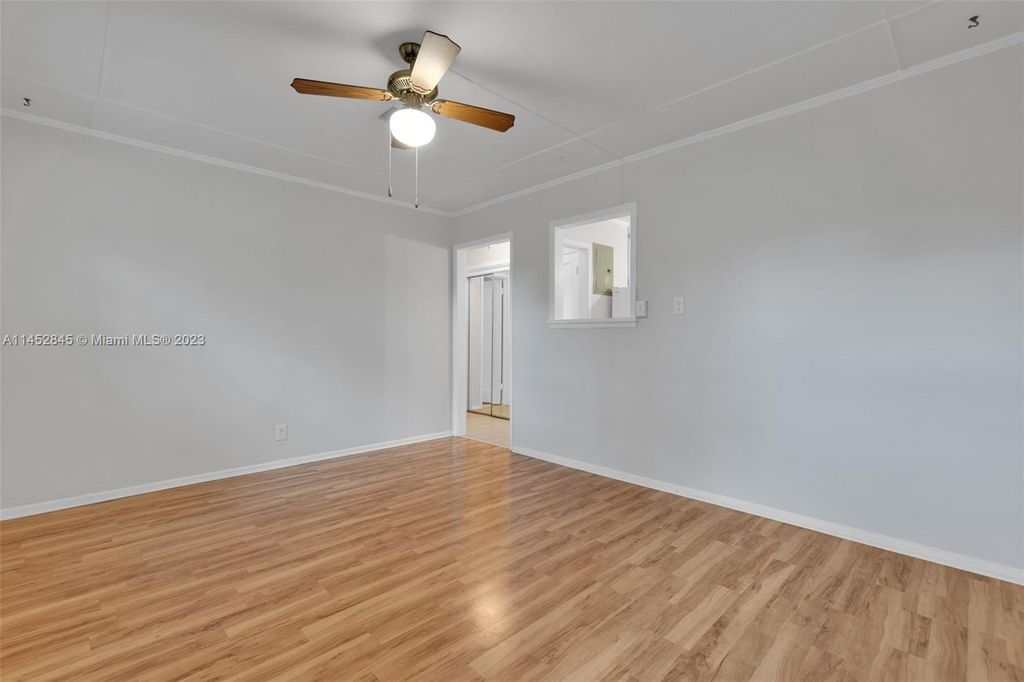 Photo of 1402 NE 36th St #1404, Oakland Park, FL 33334 (MLS # A11452845)