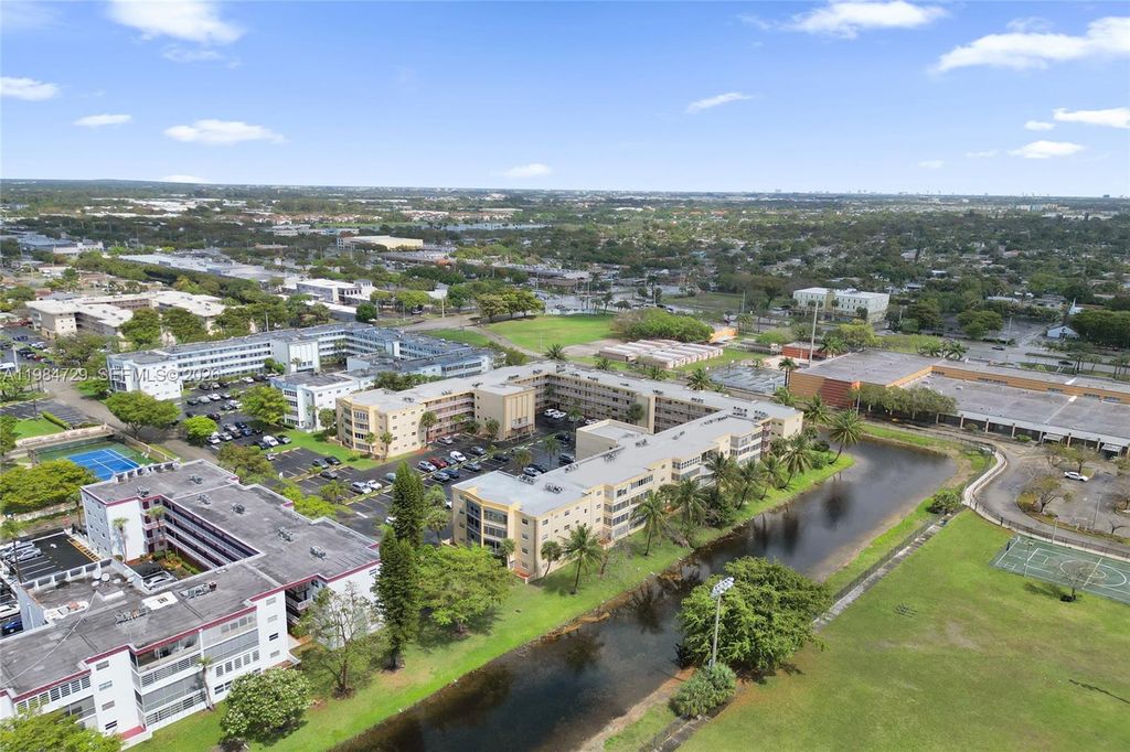 Photo of 3940 NW 42nd Ave #320, Lauderdale Lakes, FL 33319 (MLS # A11984729)