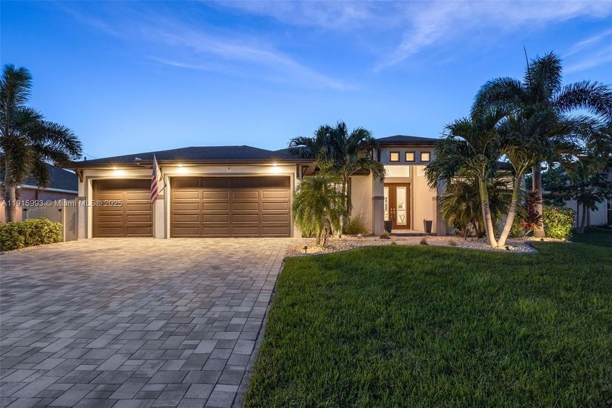 This stunning saltwater-pool home offers modern coastal living with upscale finishes including tray ceilings, tile throughout, and a spacious primary bath. A beautifully landscaped yard with Royal Palms and a pavered drive leads to the 3-car garage and bright open interior featuring a chef’s kitchen with oversized island and walk-in pantry, a flexible French-door den, and seamless indoor-outdoor flow. The expansive lanai is a true retreat with a heated saltwater pool, outdoor kitchen, electric canopy, and fenced yard positioned for gorgeous western sunsets. Impact windows and doors, an oversized laundry room, and pristine landscaping add peace of mind, and the home sits minutes from vibrant Downtown Cape Coral—an exceptional move-in-ready luxury opportunity.