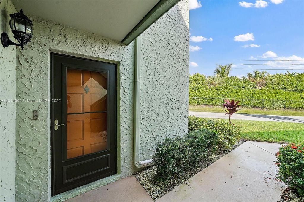 Photo of 5403 SE Miles Grant Rd #113, Stuart, FL 34997 (MLS # A11314905)