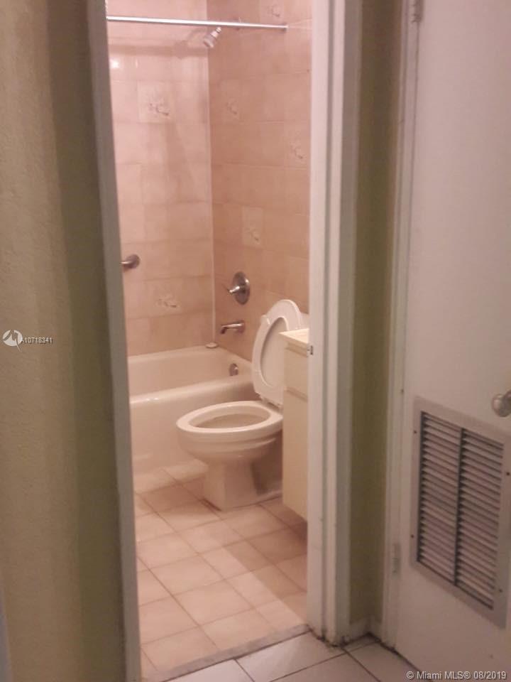 CORAL GARDENS CONDO BLDG - Residential Lease