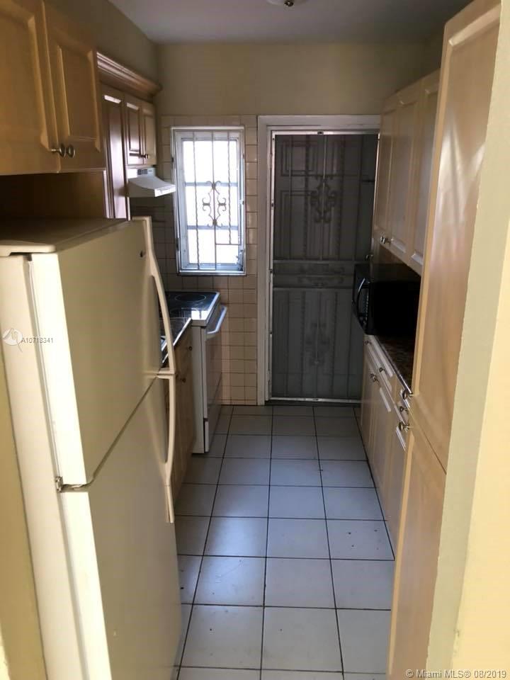 CORAL GARDENS CONDO BLDG - Residential Lease