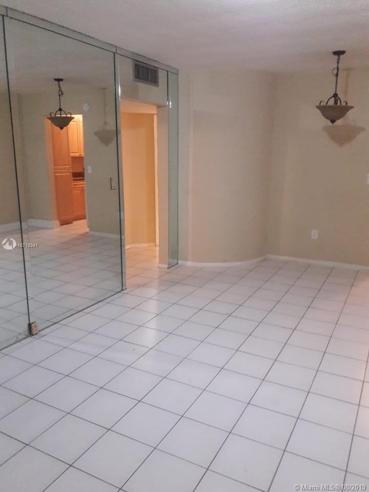 CORAL GARDENS CONDO BLDG - Residential Lease