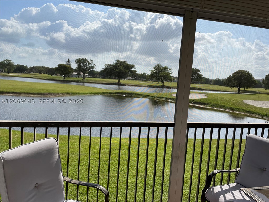 Photo of 3150 W Rolling Hills Cir #201, Davie, FL 33328 (MLS # A12069045)