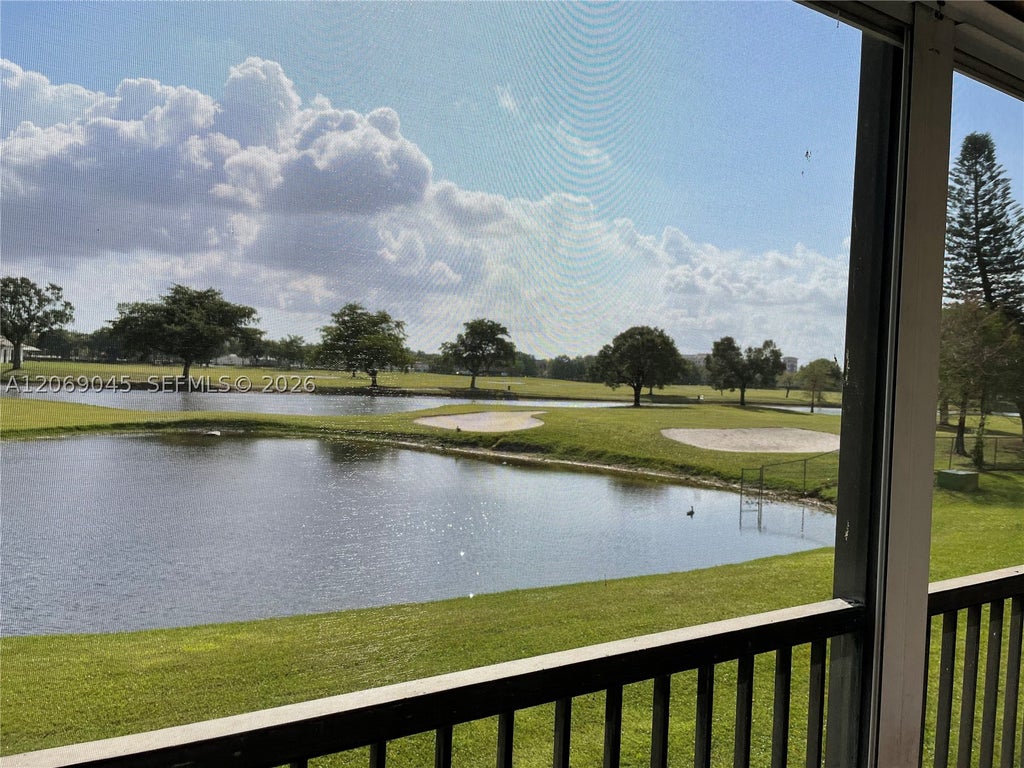 Photo of 3150 W Rolling Hills Cir #201, Davie, FL 33328 (MLS # A12069045)