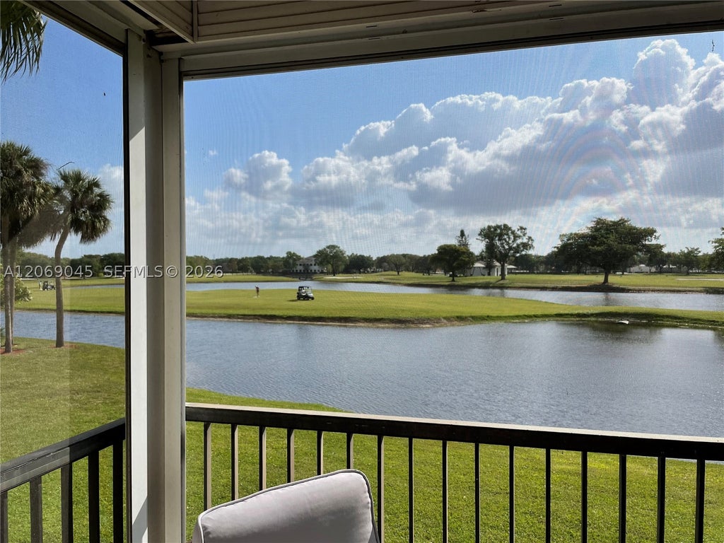 Photo of 3150 W Rolling Hills Cir #201, Davie, FL 33328 (MLS # A12069045)