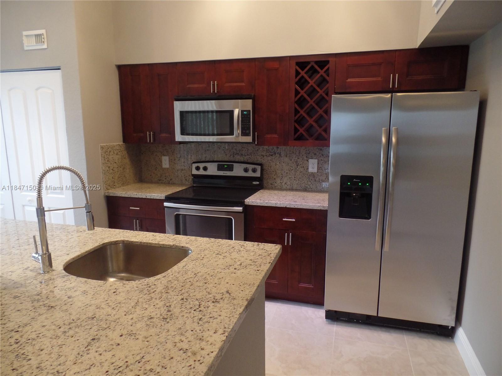 Top-floor 1BD/1BA with vaulted ceilings and serene lake views in the beautifully updated Lakeview Club. This spacious condo features a full-size washer/dryer, screened-in patio, stainless steel appliances, granite counters, walk-in closet, and tile flooring throughout—no carpet. Enjoy a newly renovated community with 3 pools, 2 Jacuzzis, gym, BBQ areas, and scenic paths around Blue Heron Lake. Centrally located just off I-95 near Commercial Blvd, minutes to Wilton Manors, Fort Lauderdale Beach, and Las Olas. Pet-friendly with generous policy. Rapid approval available!