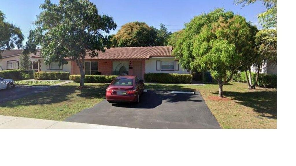 Photo of 4100 Woodside Drive #A &amp; B, Coral Springs, FL 33065 (MLS # A12016905)