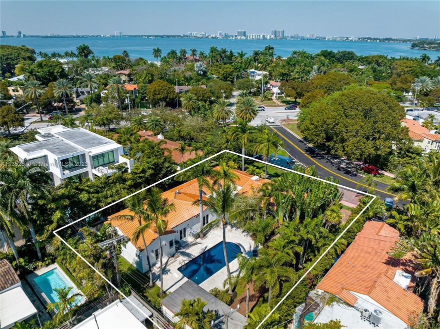 Nestled in the quaint “Lakeview” neighborhood of Miami Beach, this charming home awaits you. Situated on a spacious double lot encompassing 13,300 sf. Soak up the sun and unwind around the inviting pool, surrounded by lush tropical landscaping. The main house boasts 4 beds and 3.5 baths, and there’s a guest house with an en-suite and kitchenette for added convenience. Renovated and expanded in 2013, this property retains its original 1934 charm while offering modern updates for your comfort. A prime location in the heart of Miami Beach, with easy access to the city’s most popular destinations. Stroll to Fisher Park or venture a few minutes to discover Miami’s renowned attractions such as Lincoln Rd, South of Fifth, Design District, Bal Harbour and our stunning beaches.