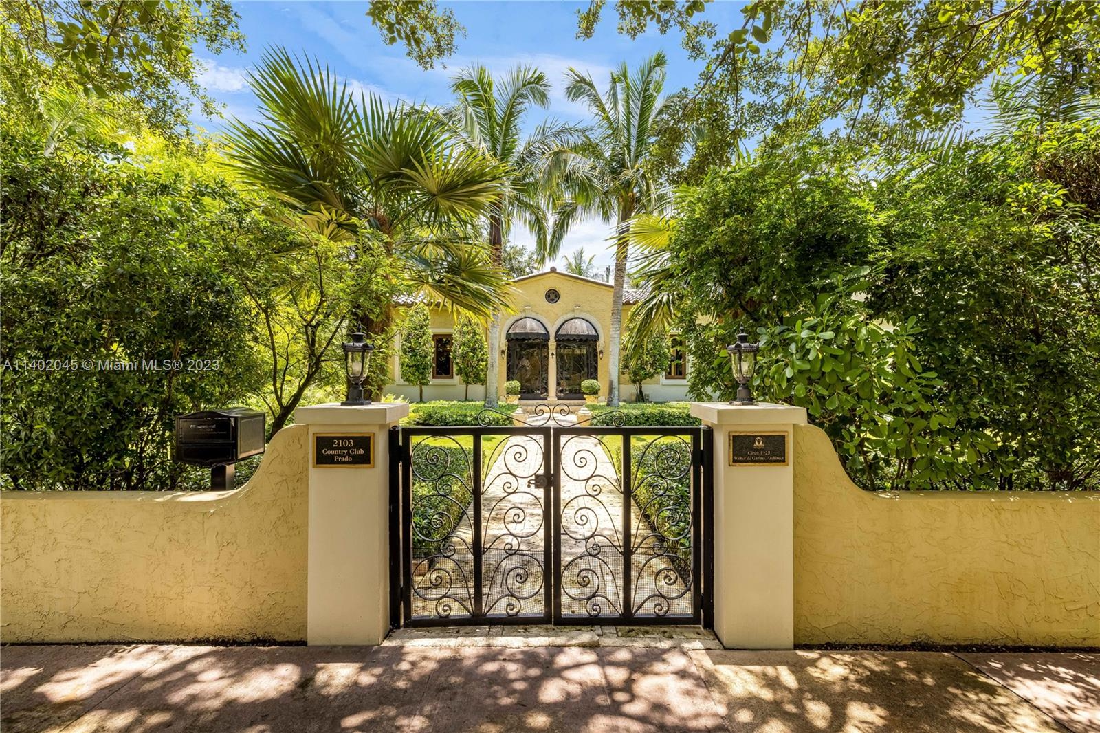 Fall head over heels for this restored and updated Historic Walter de Garmo on iconic Country Club Prado greenway & historic fountain park. Fully gated, w/ thriving koi pond in lushly landscaped grounds, w/ Old Man Palms, Bleeding Heart vine, Tree of Life. Old Spanish features incl wrought iron framed entrance foyer w/ Cuban tile, stained glass porthole windows & vaulted wood beam ceiling extending to living room w/ Fireplace feat original andirons. Large eat-in kitchen, oversized island, Lacanche stove, SubZero R/F. 2/1 downstairs used as bedroom & office. 2/1 upstairs used as primary suite. 1/1 guest wing. Pool patio w/ cabana bath. La Finestra impact W+D. Tiled/AC’d 1 1/2 car gar & laundry room. ‘22 historic board approved roof, ‘05 septic , ‘05/12 electric & plumbing, ‘21/22 AC motors.