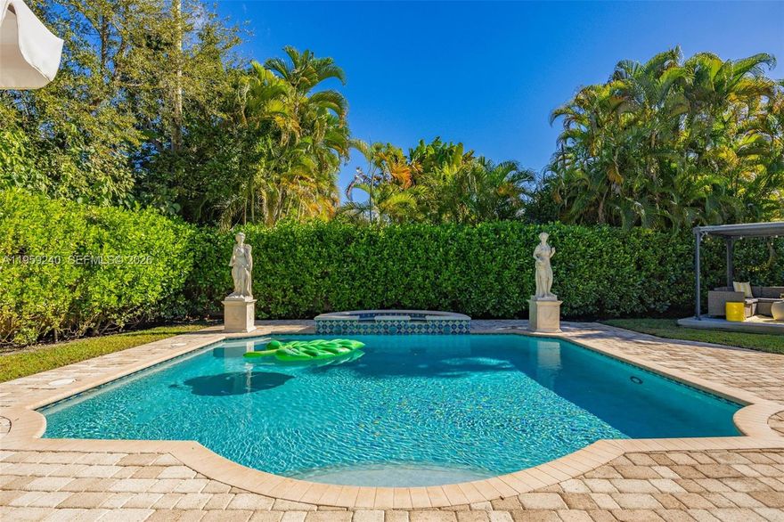 MIAMI SHORES POOL PARADISE! Welcome to your private tropical retreat on a secluded approx. 9,000 sq ft corner lot in the heart of Miami Shores. This beautifully renovated 2-bedroom, 1-bath is perfect for entertaining or simply relaxing in your own backyard oasis. The resort-style outdoor space features a sparkling heated pool with jacuzzi and waterfall, spacious cabana, lush tropical landscaping, and an expansive lawn - truly a rare find in Miami Shores. Inside, you'll discover gorgeous cherry hardwood floors throughout, a modern kitchen with granite countertops, stainless steel appliances, and custom cabinetry, plus a stylishly updated bathroom with pedestal sink and luxurious rain shower. Living room & Family room add to the living space in the center of this home. The home includes a 1-car garage. Impact windows throughout for peace of mind, and an excellent open floor plan ideal for modern living. Location is everything - walk to 2nd Avenue shops, Starbucks, Pura Vida, restaurants, gyms, and parks, while being just minutes from world-class beaches, shopping, dining, and golf. First time available in 10 years! First showings begin at Open House -Saturday, February 7, 2026, from noon to 2:30 PM.