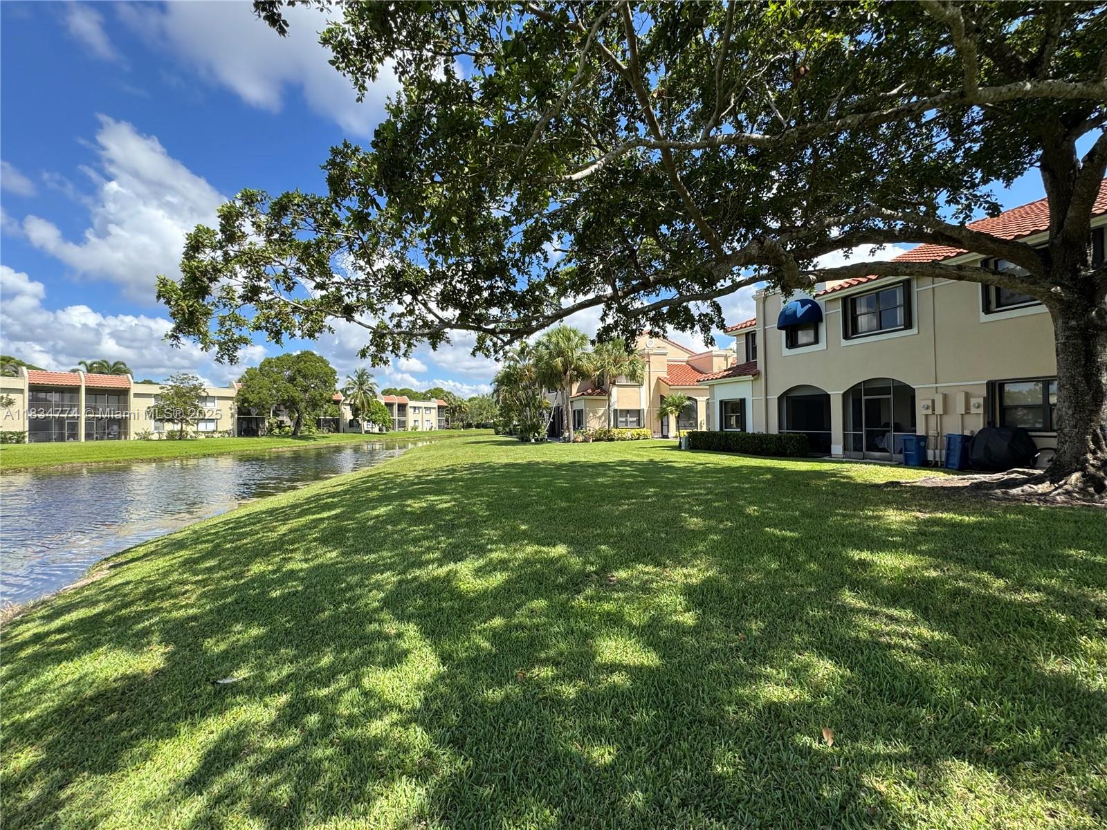 SPACIOUS 3 BEDROOM 2 AND A HALF BATH TOWNHOUSE IN NEIGHBORHOOD OF VISIONS FOR RENT! CORNER UNIT-WITH LOTS OF PRIVACY. INCREDIBLE LAKE VIEW !! SCREENED PORCH . NEW EAT IN KITCHEN, LOSTS OF STORAGE. COMMUNITY POOL ,CHILD PLAYGROUND AND MORE