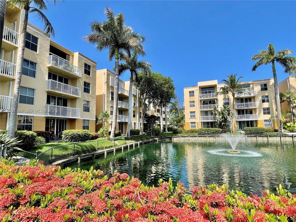 Photo of 1341 SE 3rd Ave #102, Dania Beach, FL 33004 (MLS # A12031349)