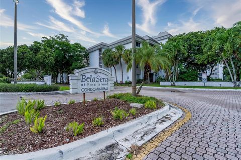 Photo of 711 N Pine Island Rd #410, Plantation, FL 33324 (MLS # A11880922)