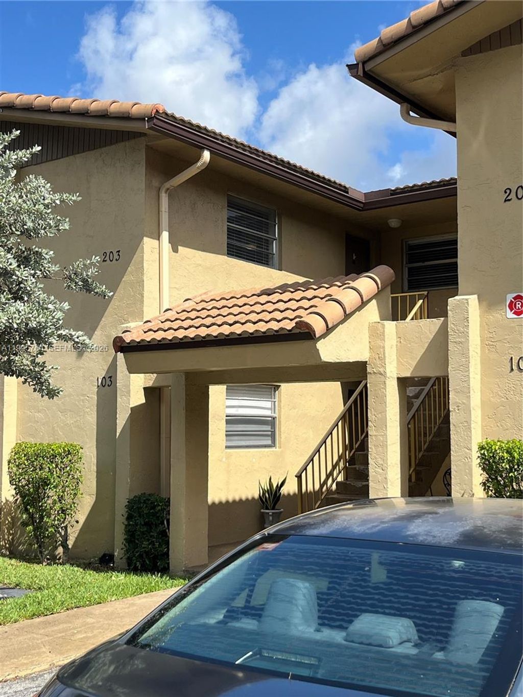 Photo of 11101 Royal Palm Blvd #203, Coral Springs, FL 33065 (MLS # A11995764)