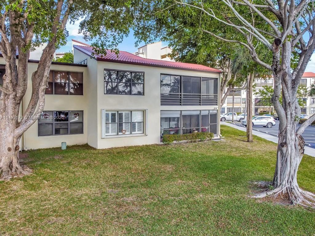 Photo of 2300 S Cypress Bend Dr #201, Pompano Beach, FL 33069 (MLS # A11493172)