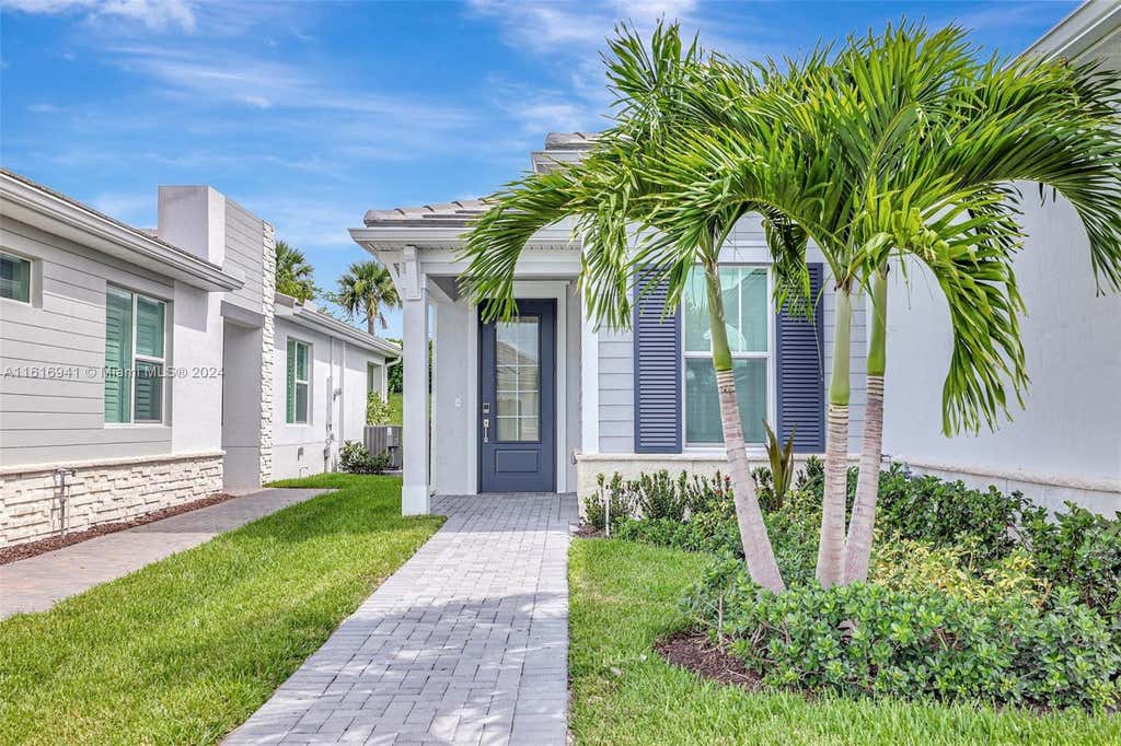 Photo of 11551 SW Viridian Blvd, Port Saint Lucie, FL 34987 (MLS # A11616941)